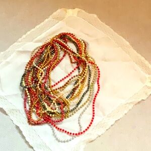 MULTI STRANDS AND MULTICOLOR BEADS ON A 2 CLASP NECKLACE